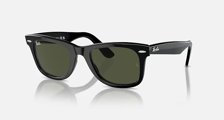 Ray-Ban Wayfarer Classic in black acetate, three-quarter front view on a cream background